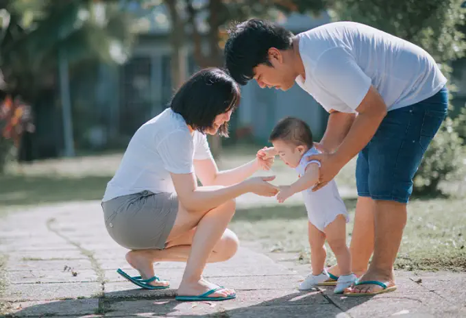 Parents and young child protected by life insurance
